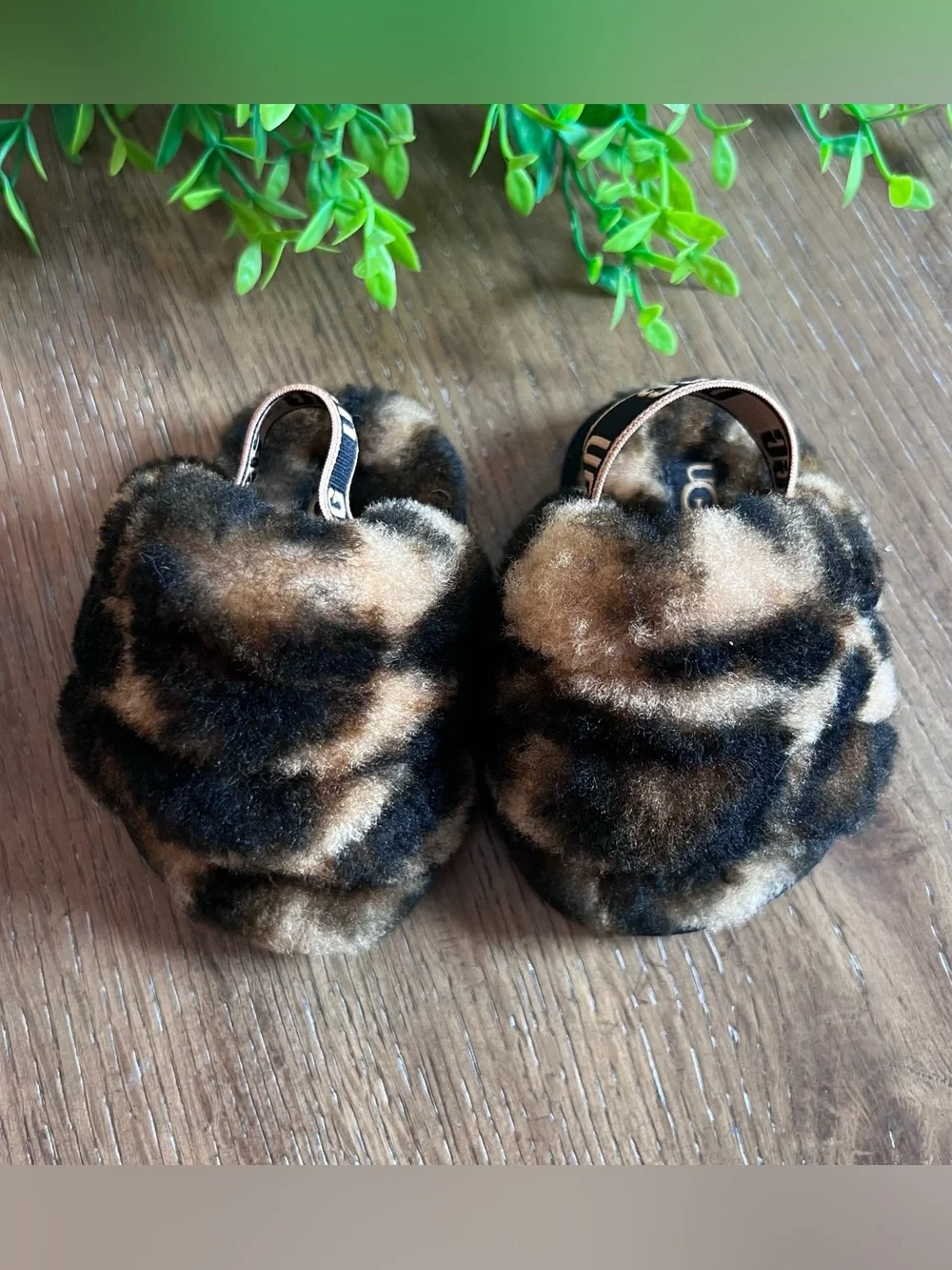 UGG Leopard Print Fuzzy Baby Slippers in Brown and Black